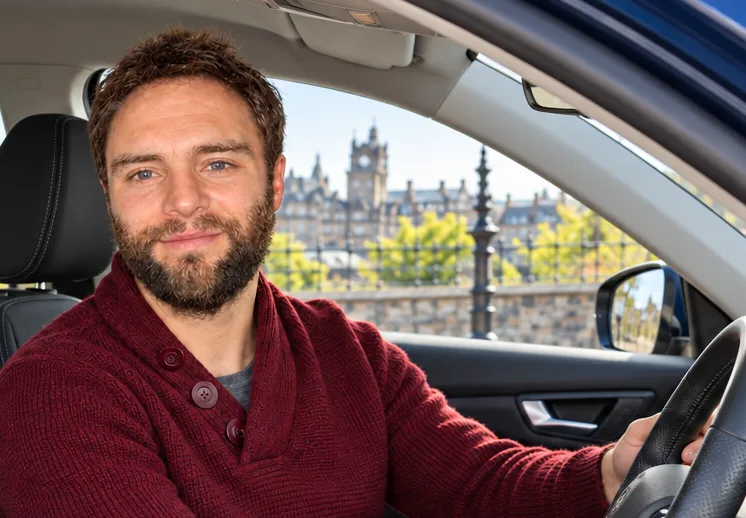 Adrian Palmer in a car